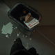 A trash can contains a discarded box for red pills with "Noggin Joggers" written on the side.